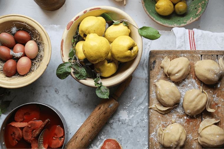 Quince pies being prepped in the kitchen